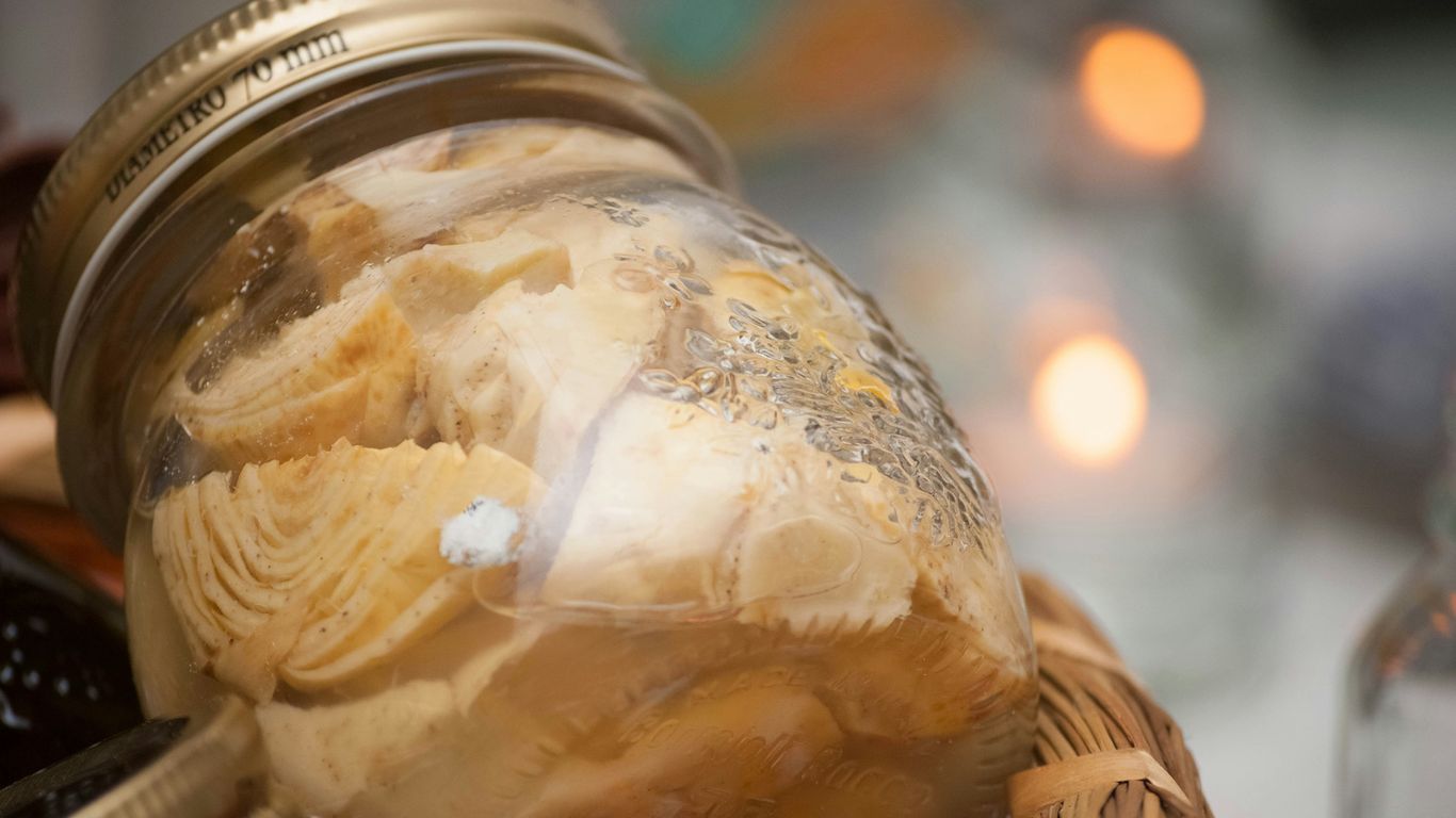 fermented vegetable in clear glass jar