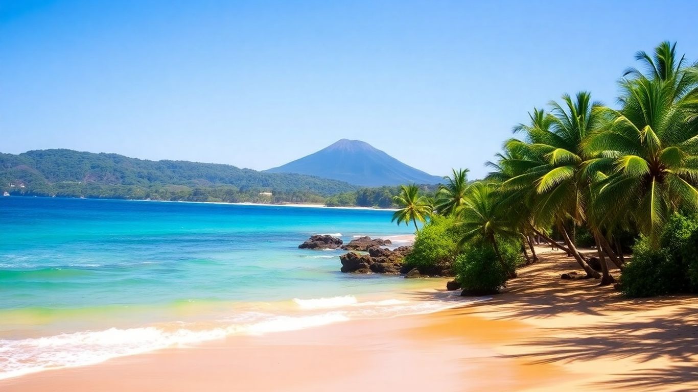 Guanacaste, Costa Rica beach with palm trees and ocean.