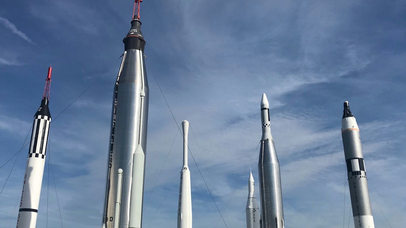low angle photo of concrete towers