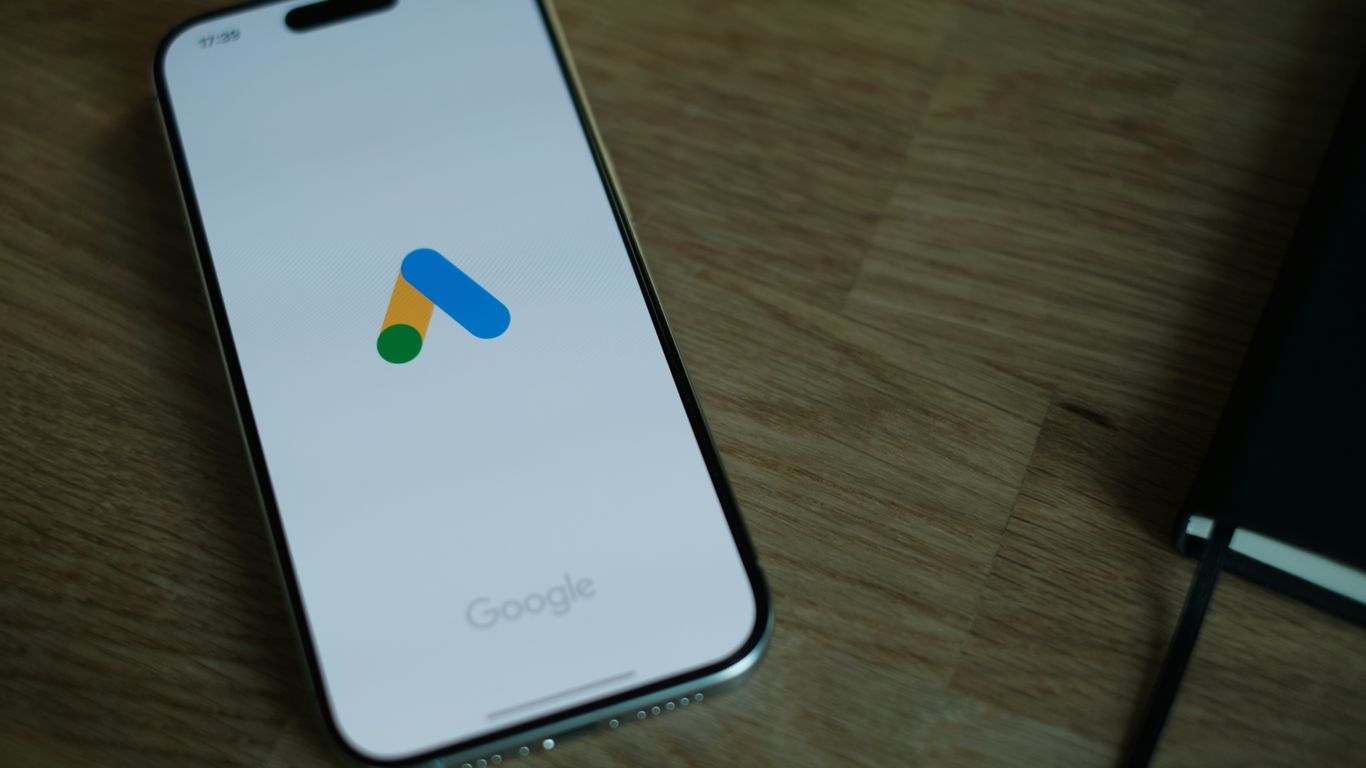 A close up of a cell phone on a table