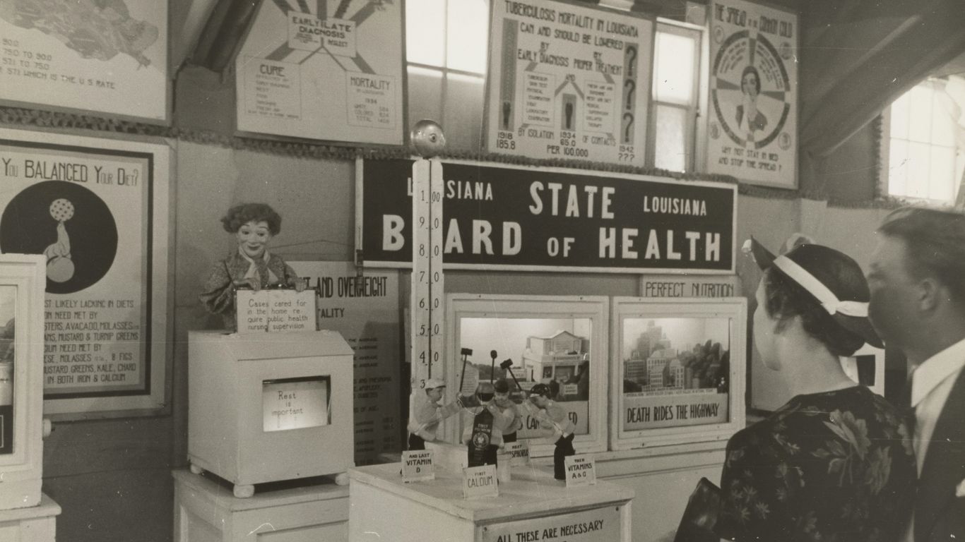 a couple of people that are standing in a room