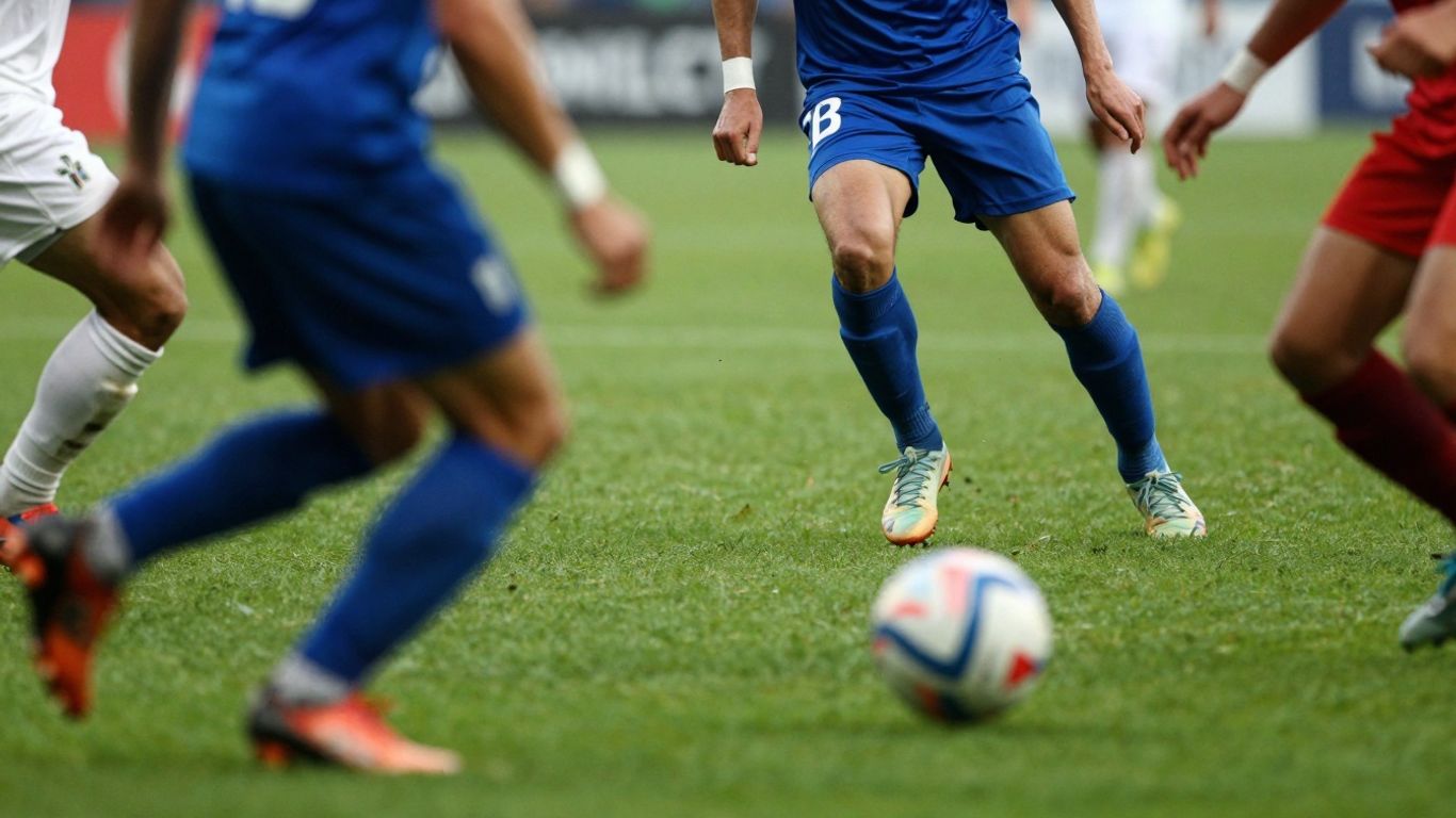 Football players in action on a green pitch during a match.