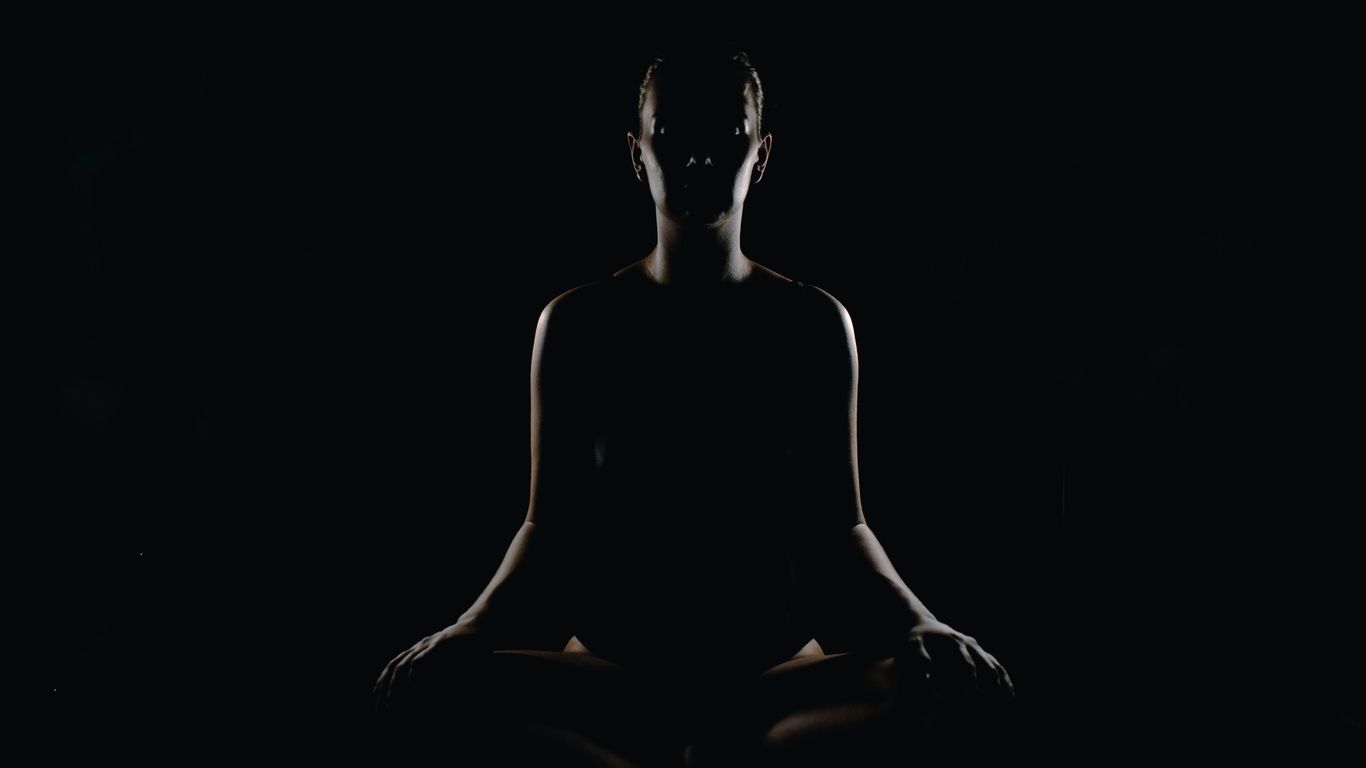 person doing meditation pose