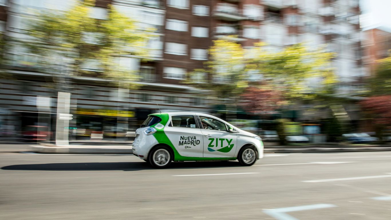 white and green mini cooper on road during daytime