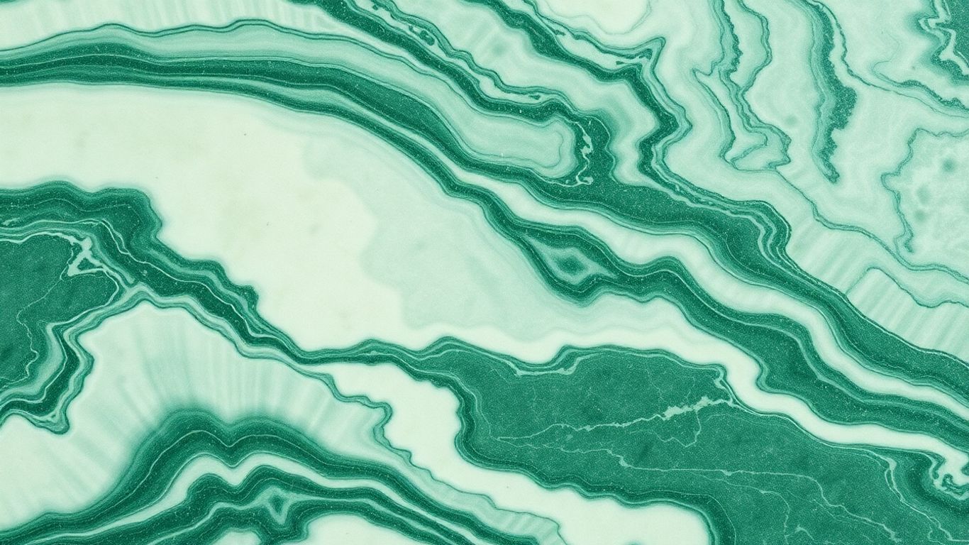 Polished Ming green marble slab with intricate veining.