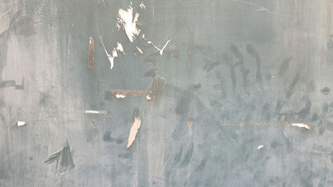 A black and white photo of a person on a skateboard