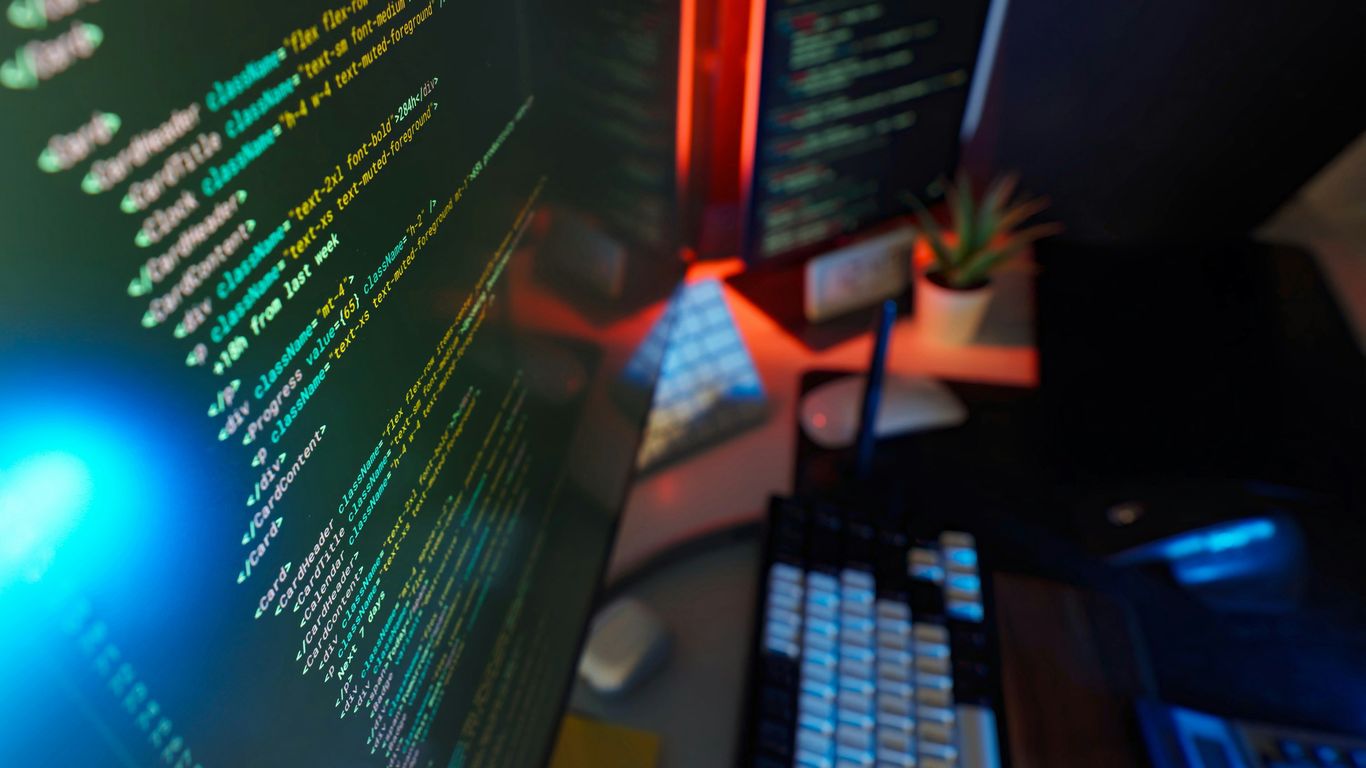 Coding on dual monitors.