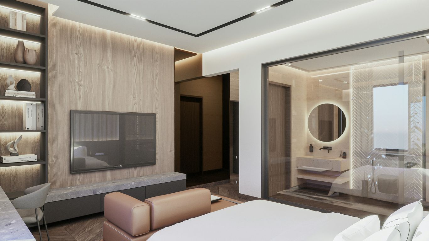 a bedroom with a large bed and a flat screen tv