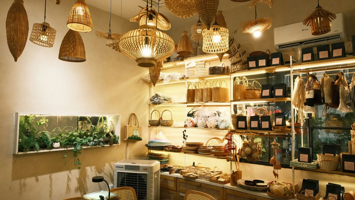 Cozy shop interior with woven lamps and shelves