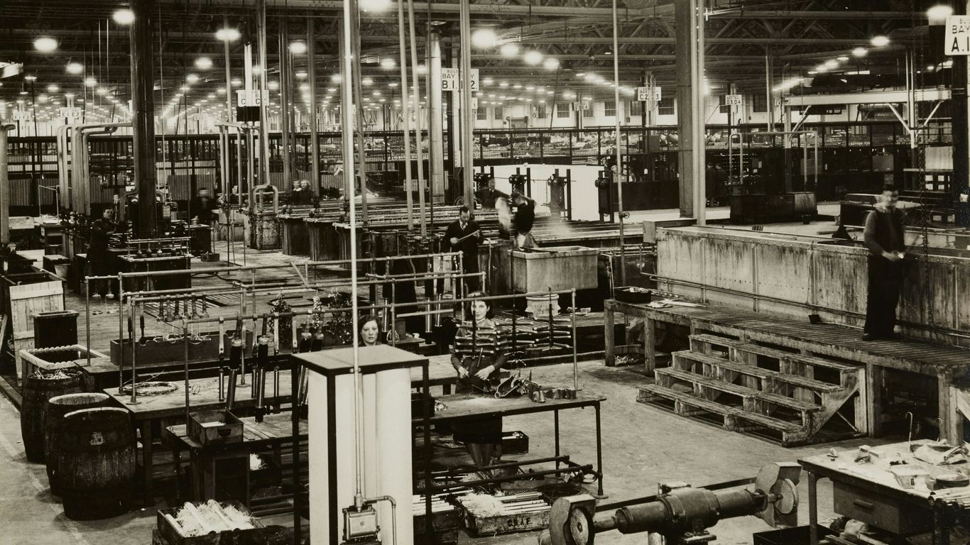 grayscale photo of industrial machine