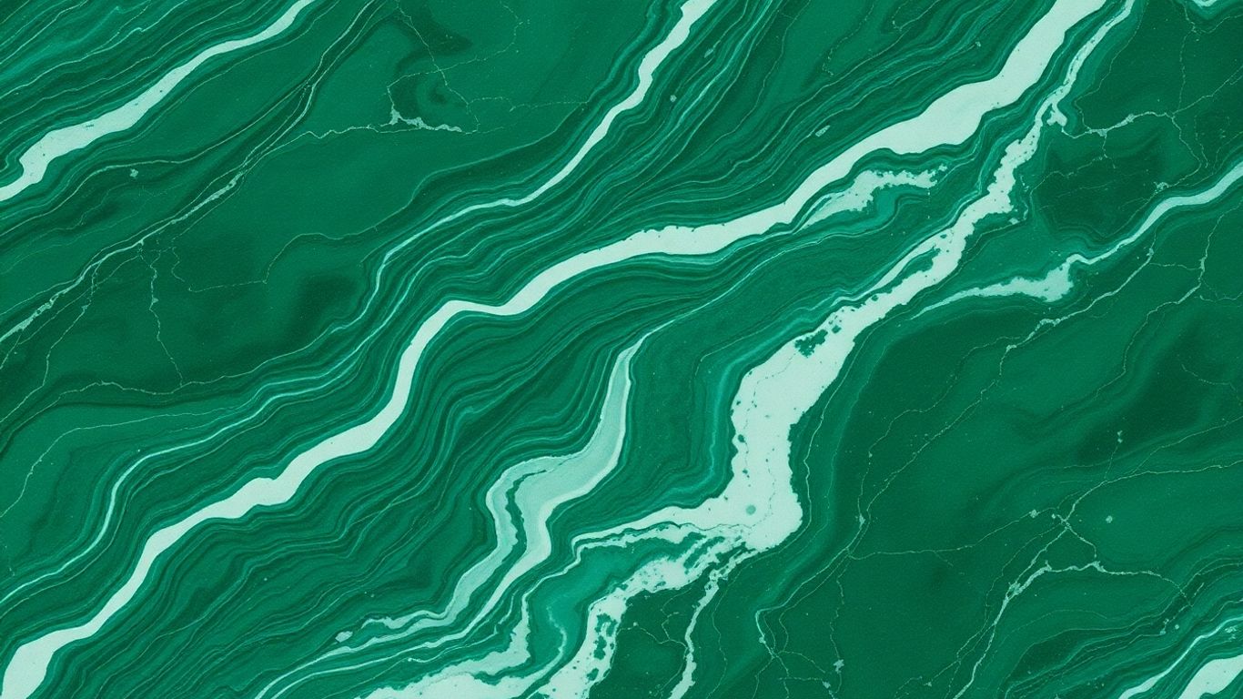 Polished Ming green marble with swirling green and white patterns.