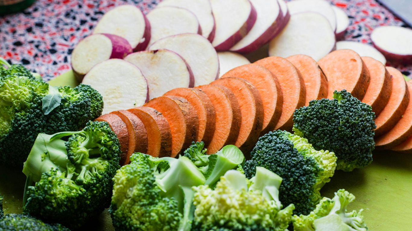 sliced carrots and green vegetable