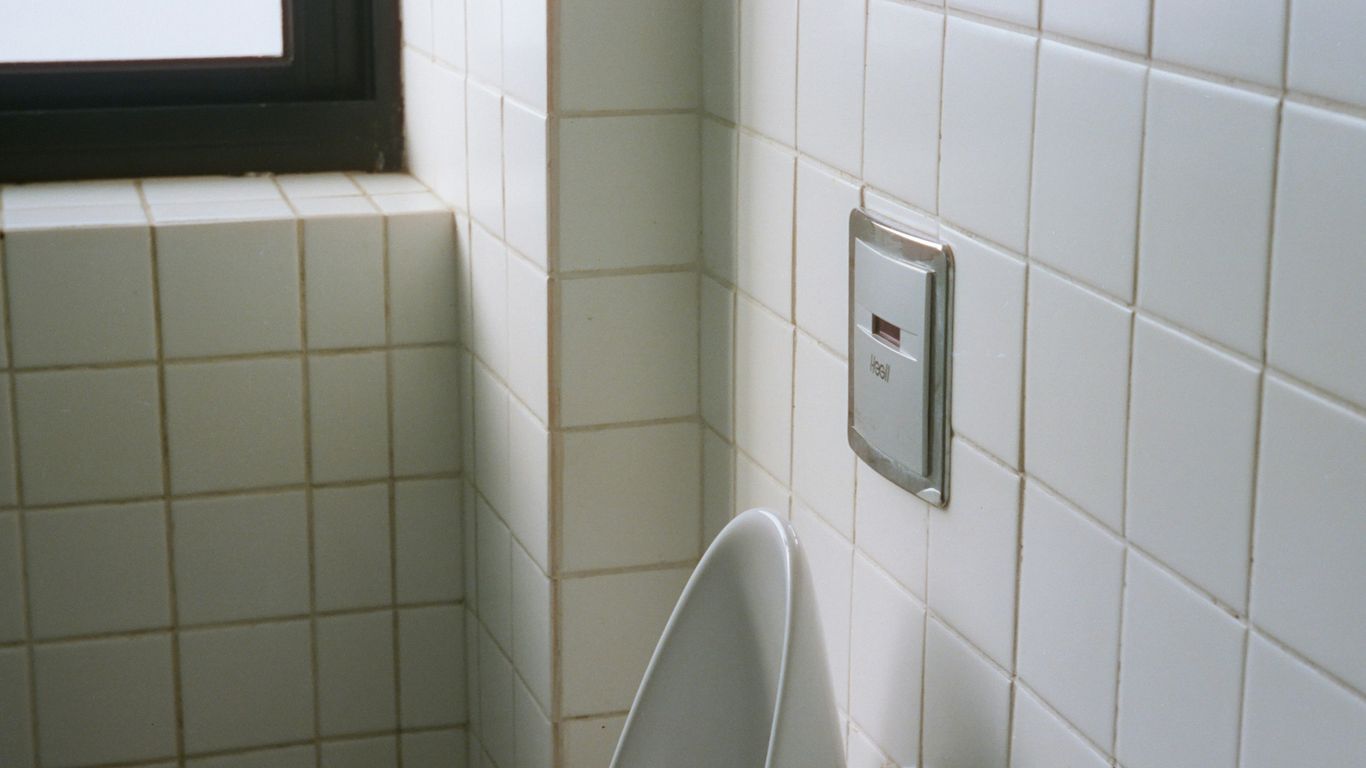 a urinal in a bathroom