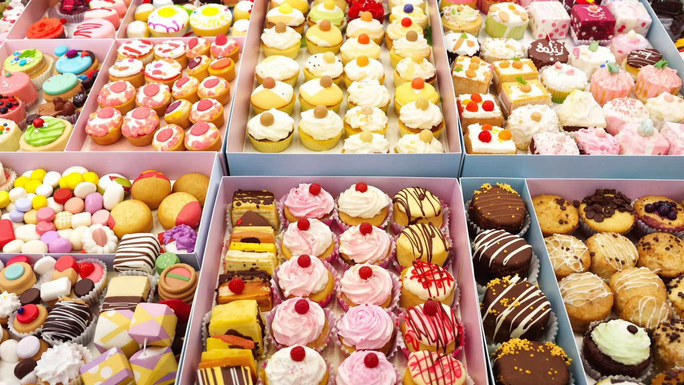 Assortment of sweet pastries and dessert boxes.