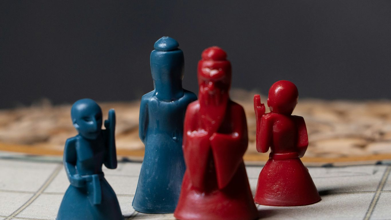 a close up of a game board with pieces of plastic
