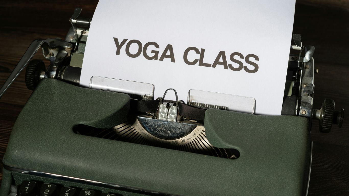 a box with a key chain and a key chain on a table