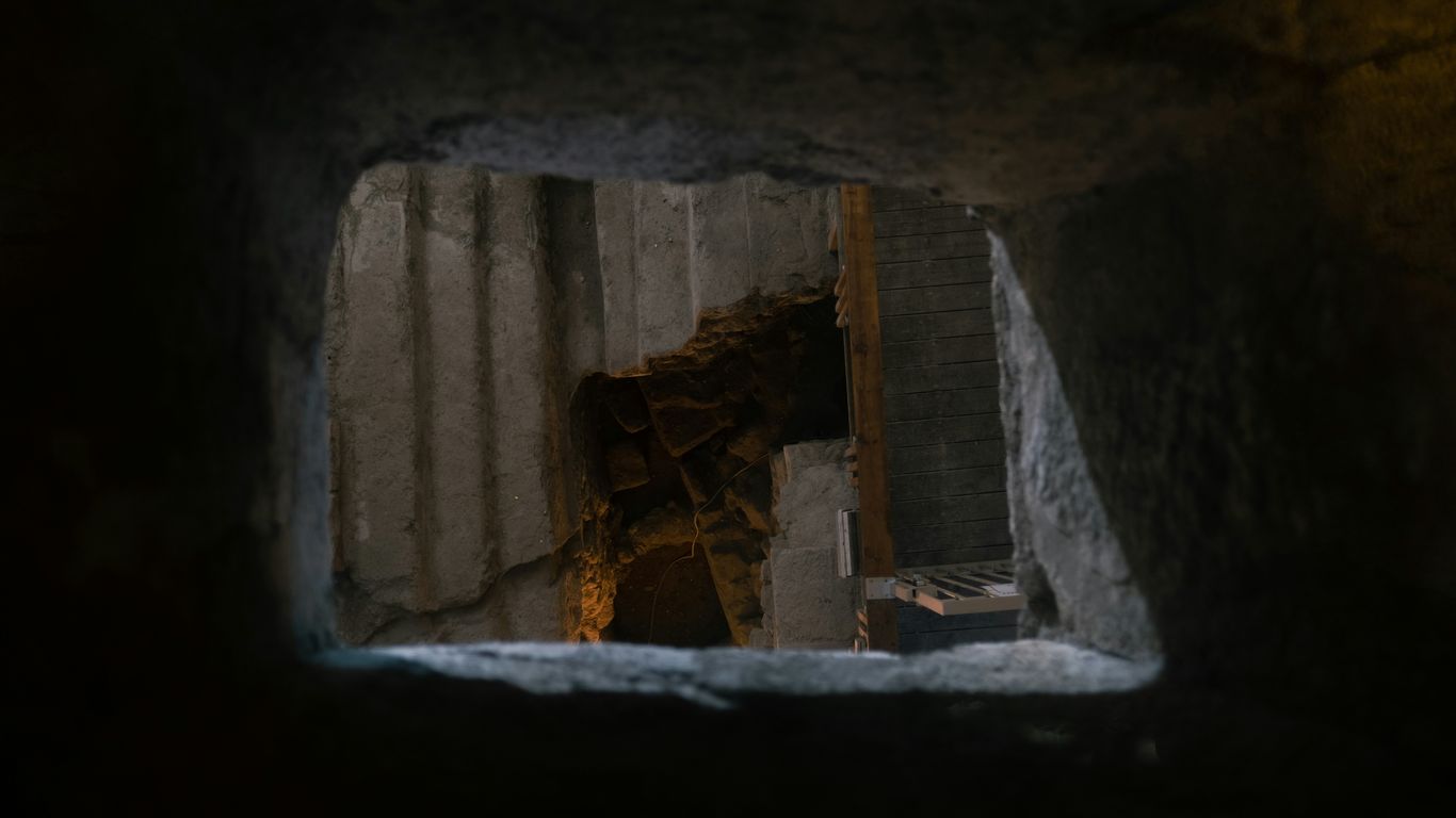 a view of a doorway in a stone building