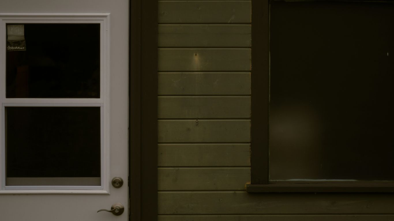 a close up of a door with a window