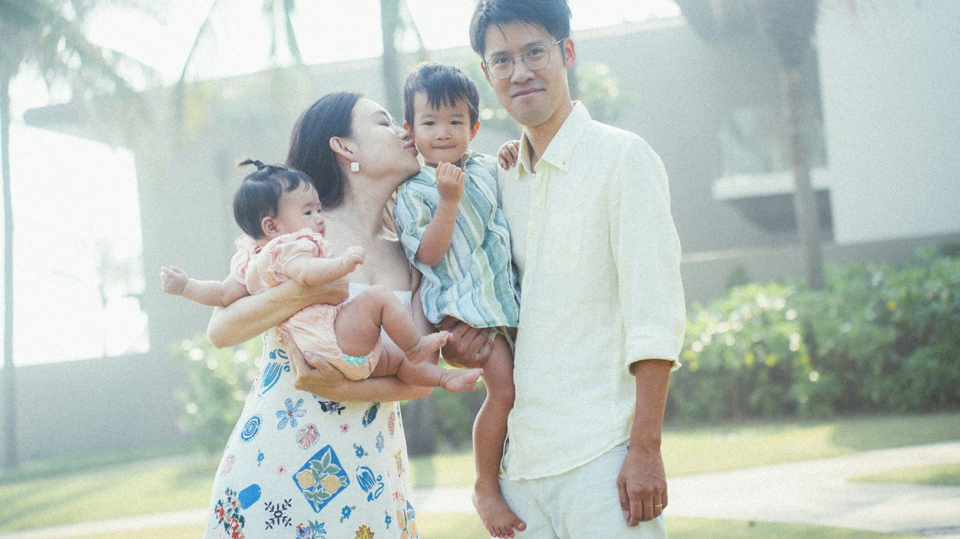 a group of people standing next to each other