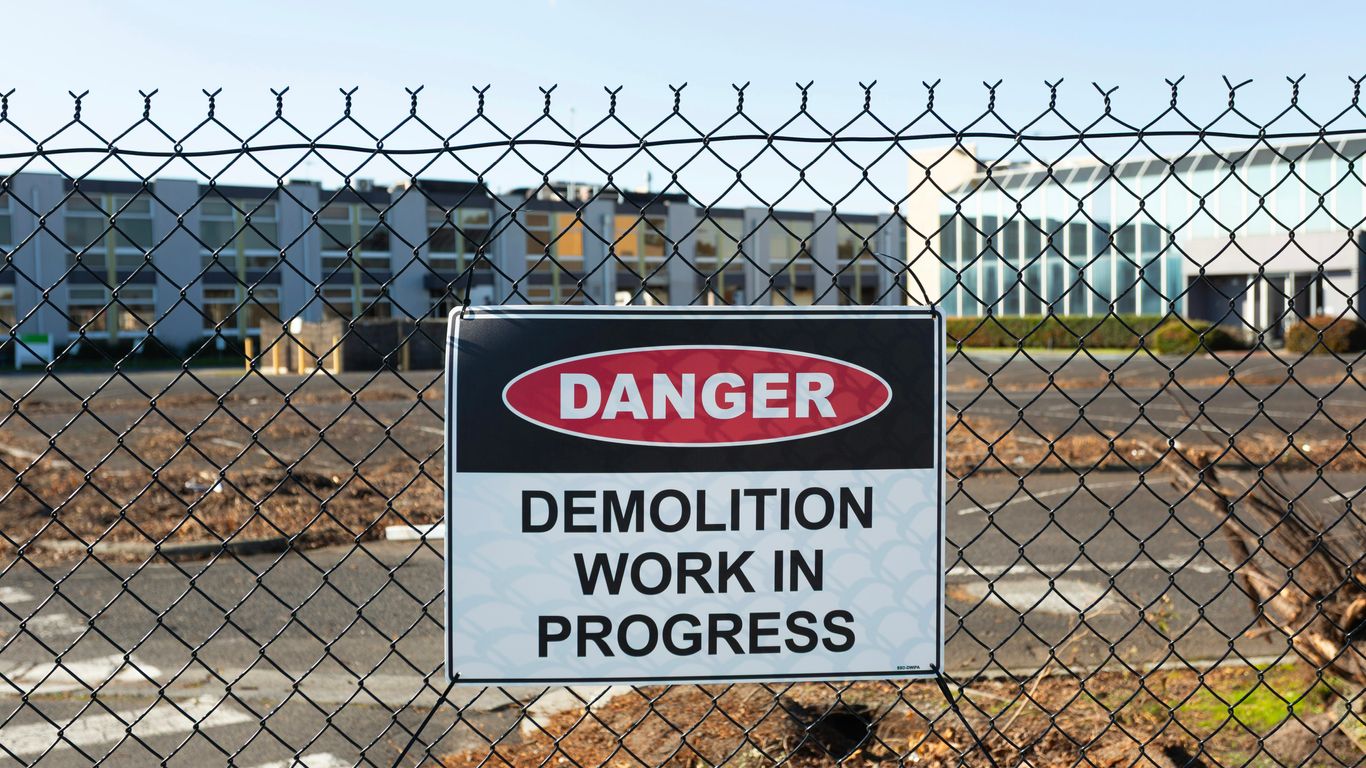 Danger sign for demolition work in progress.