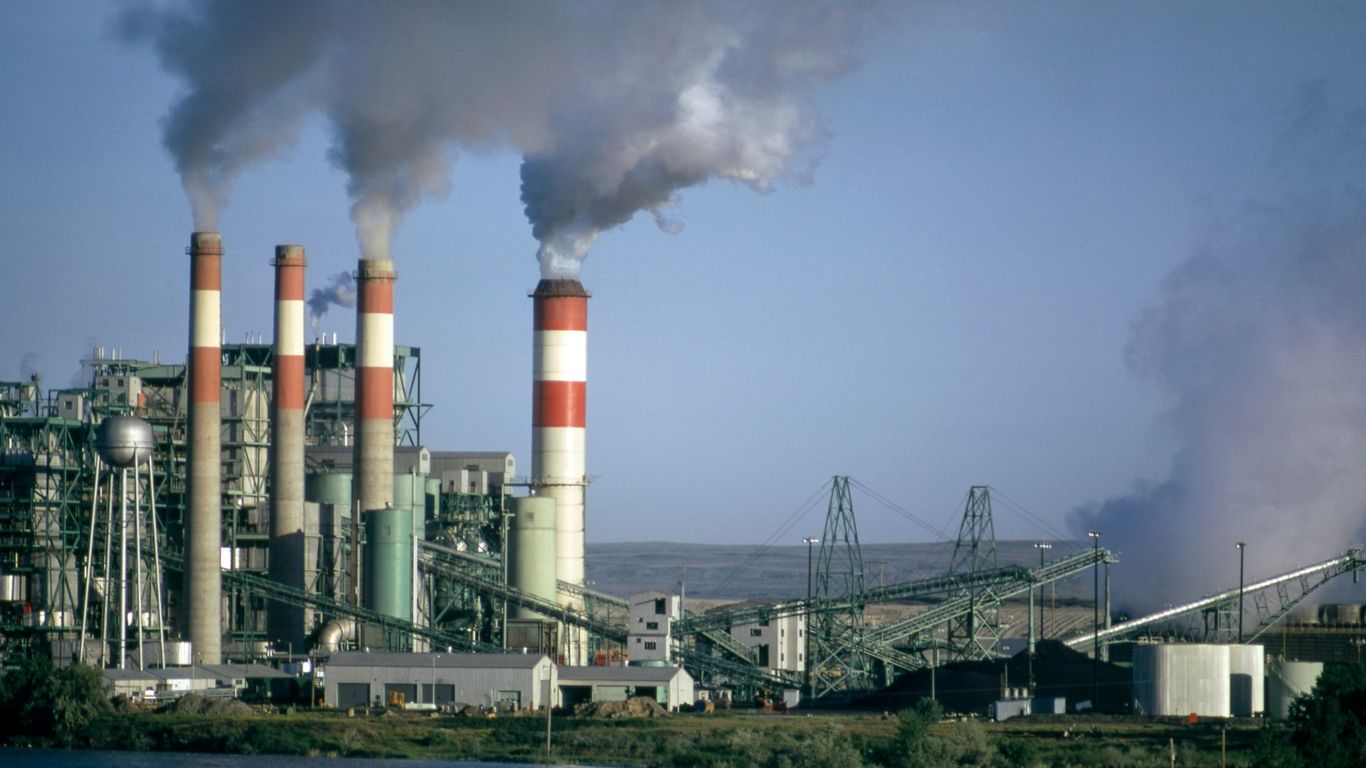 EMAS: a factory with smoke coming out of it's stacks