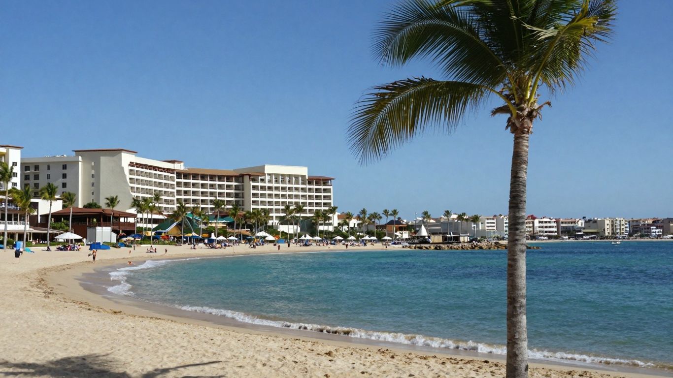 Cabo beach with hotel and palm trees