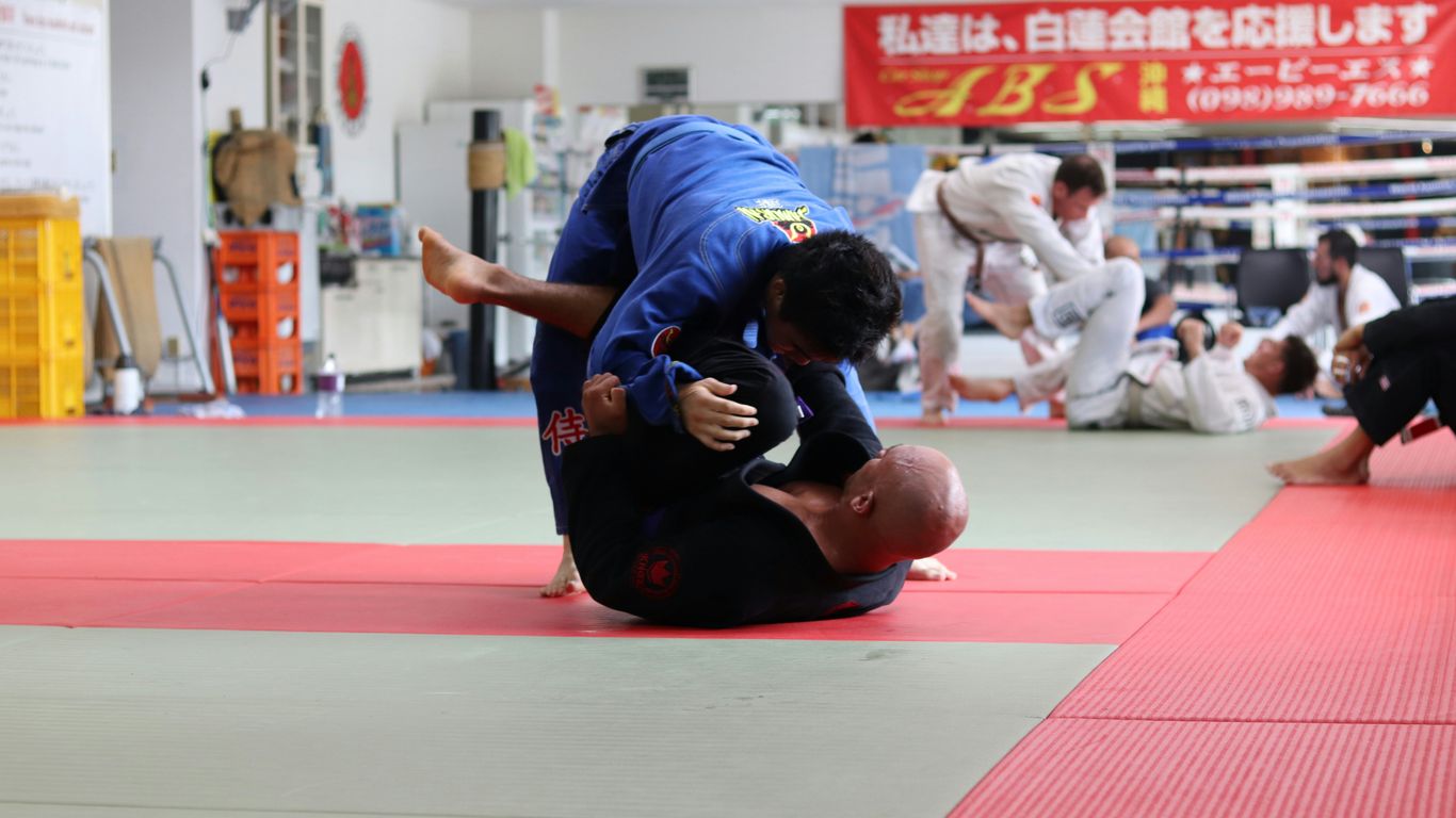 two men dueling inside room