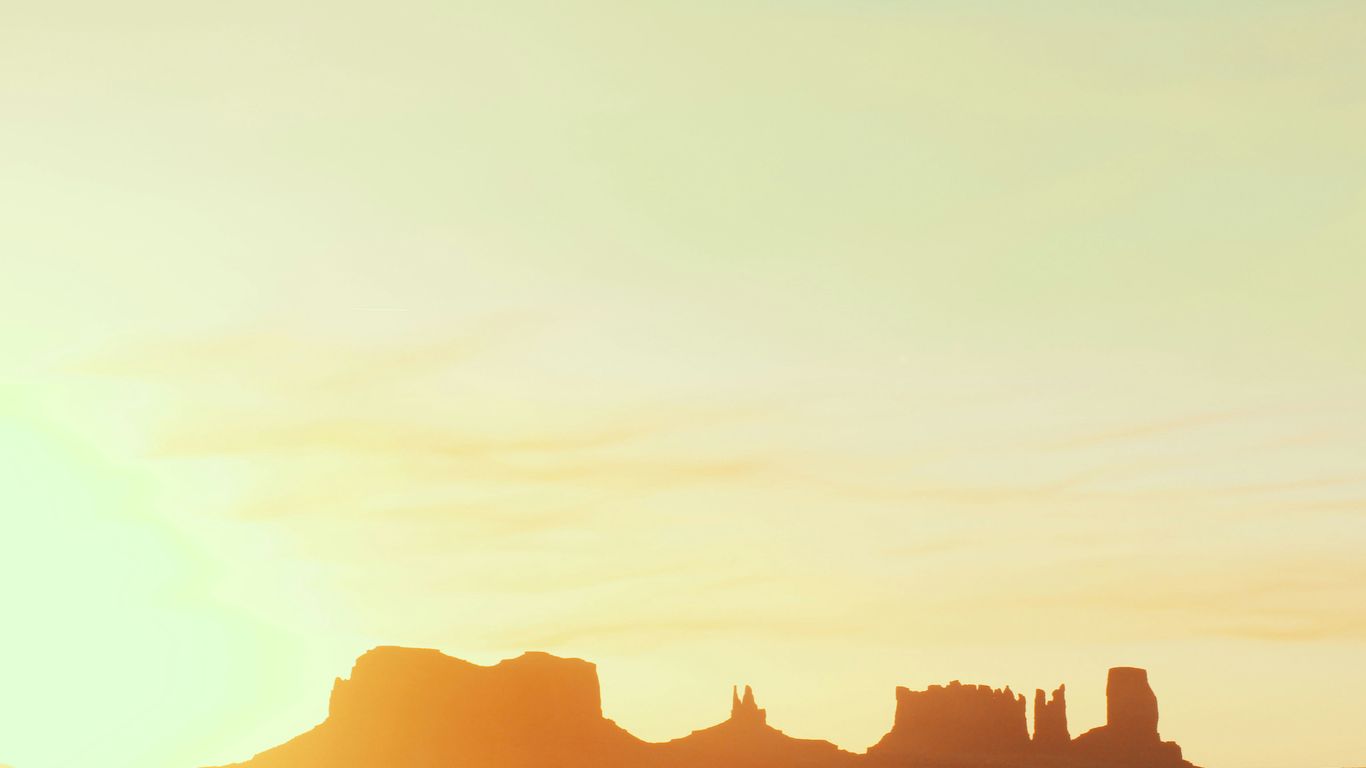 silhouette of mountain during sunset