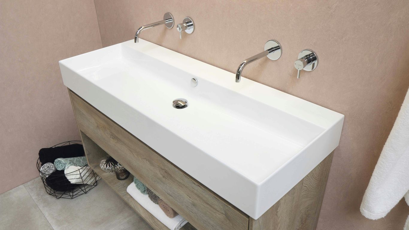 white ceramic sink with stainless steel faucet