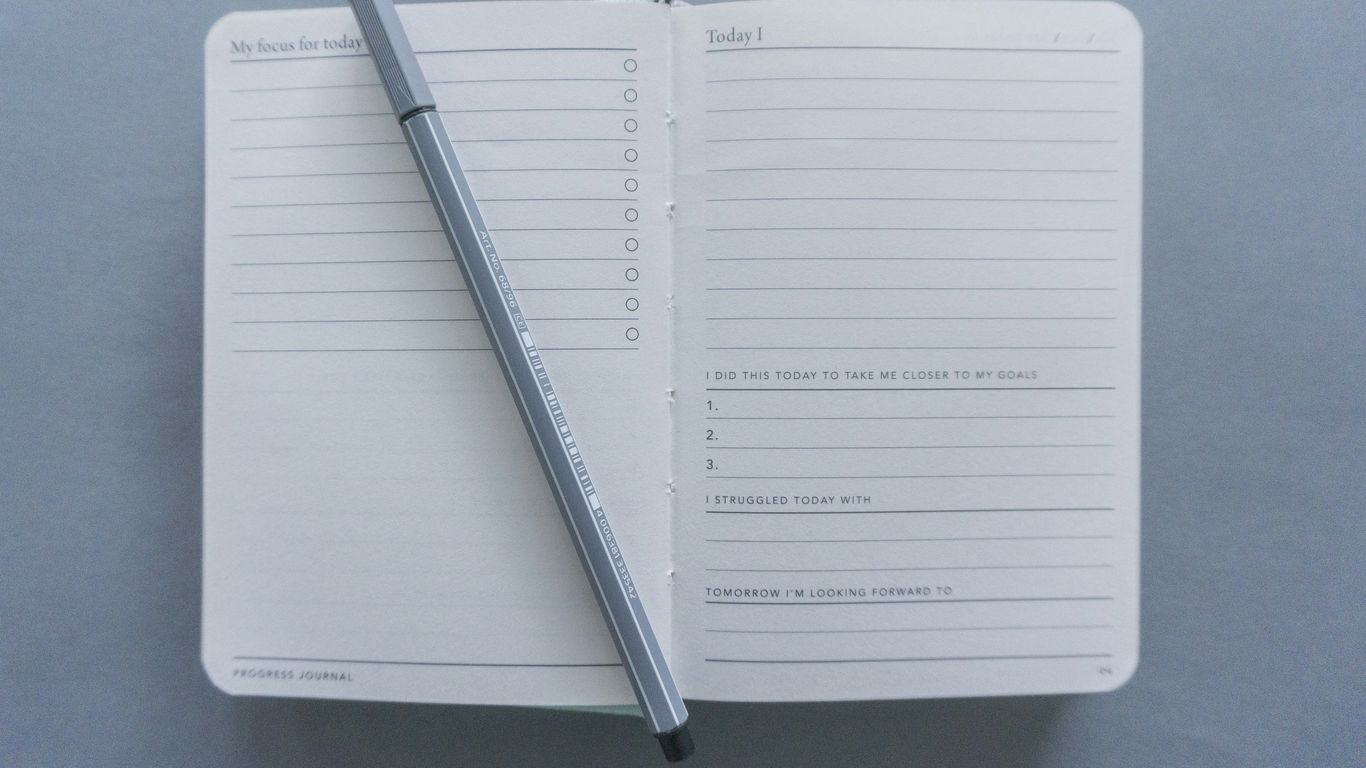 white printer paper with black pen