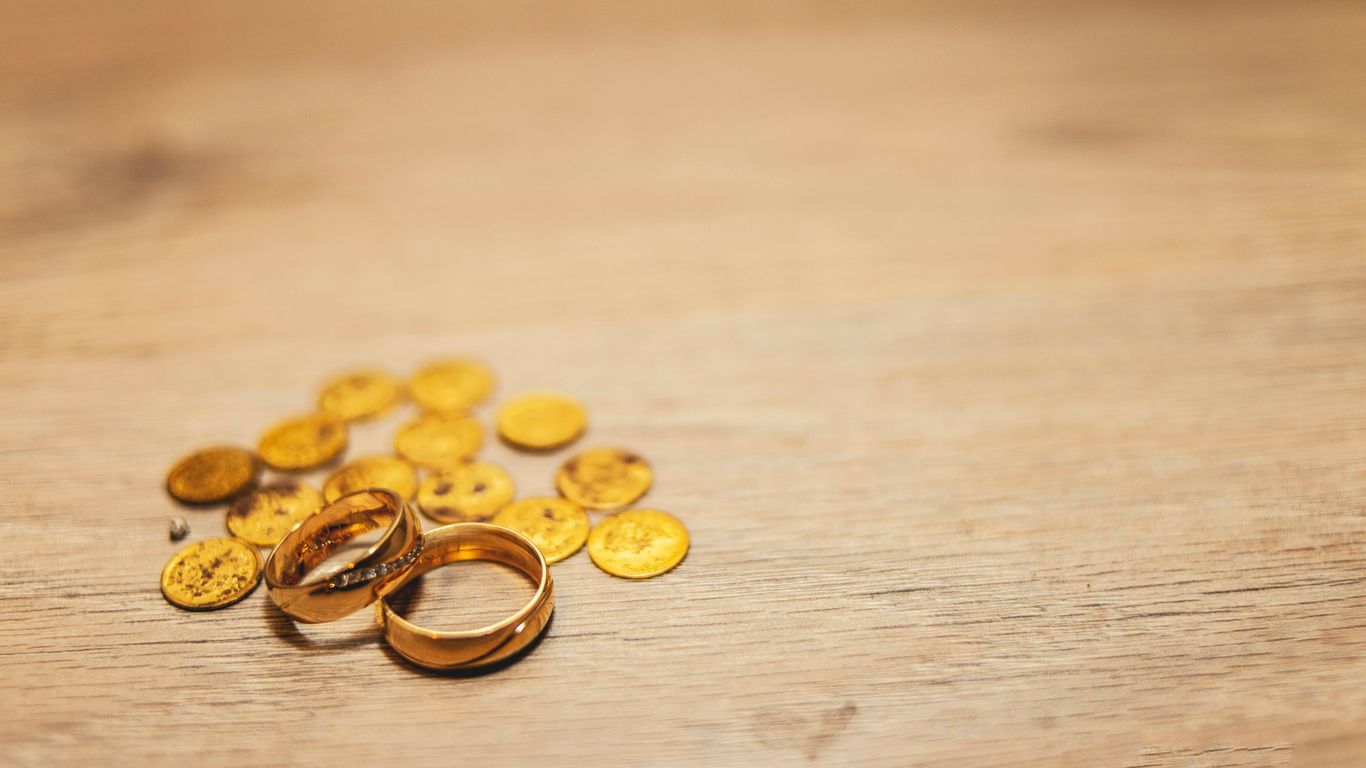 two gold-colored rings