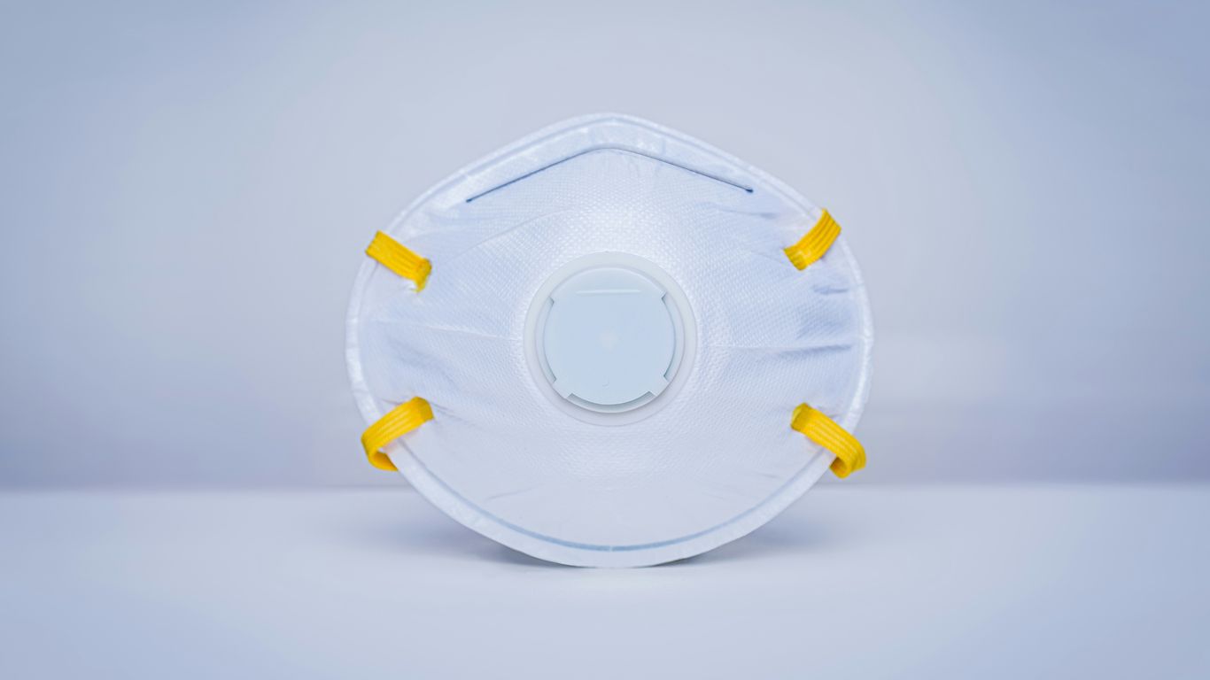 white round plastic container on white surface