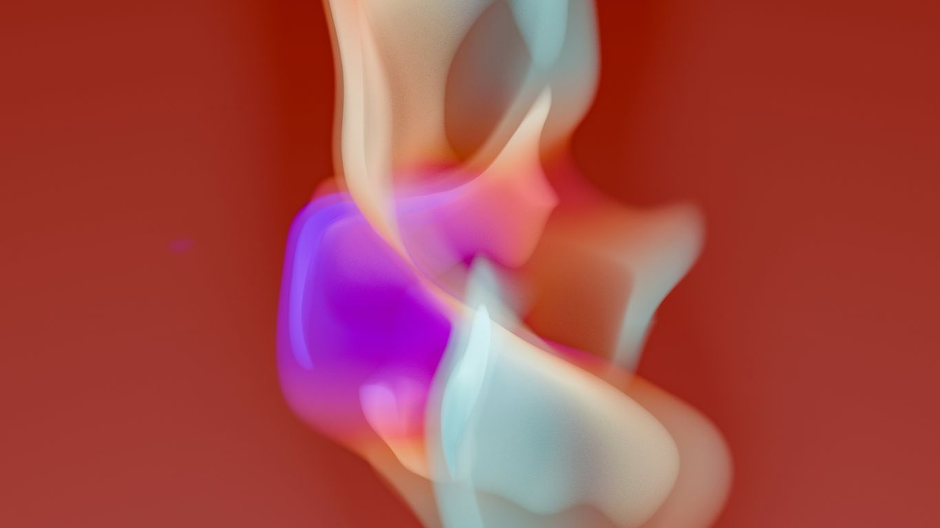 A blurry image of a woman in a dress