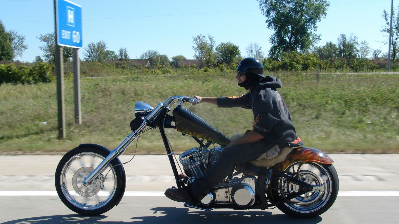 a man riding a motorcycle