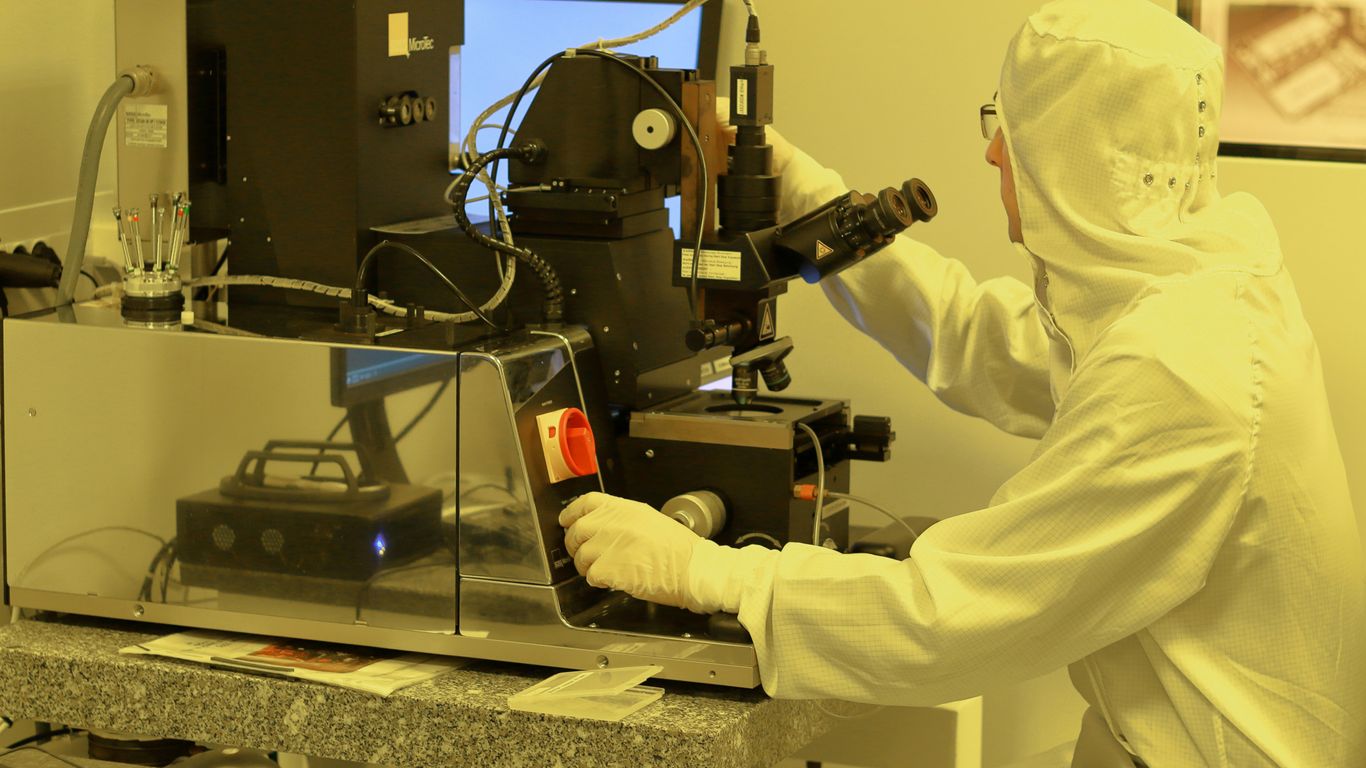 person using black industrial machine