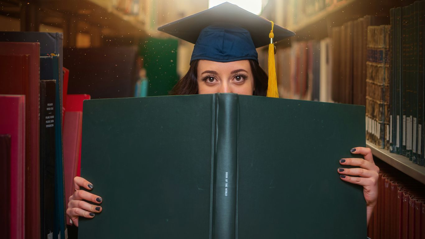 woman holding book
