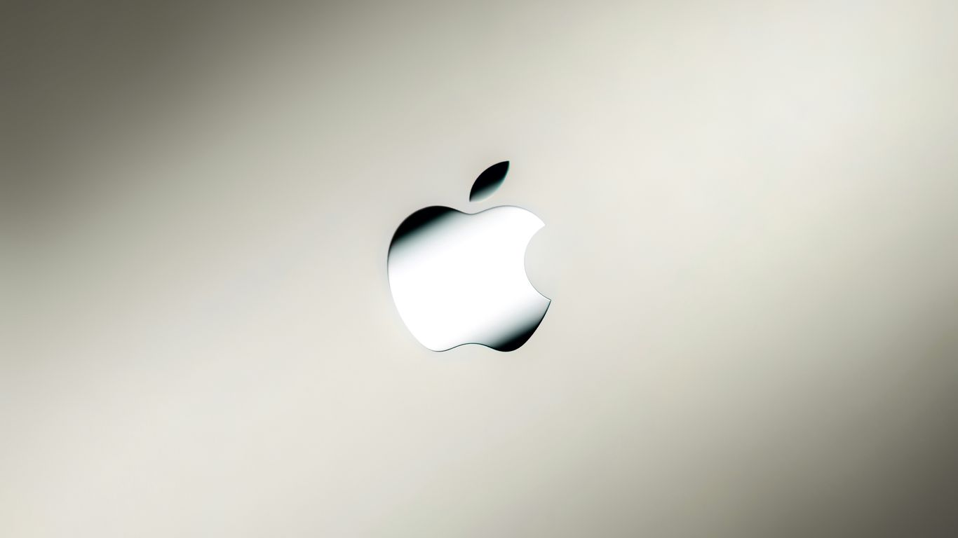 an apple logo on a silver background
