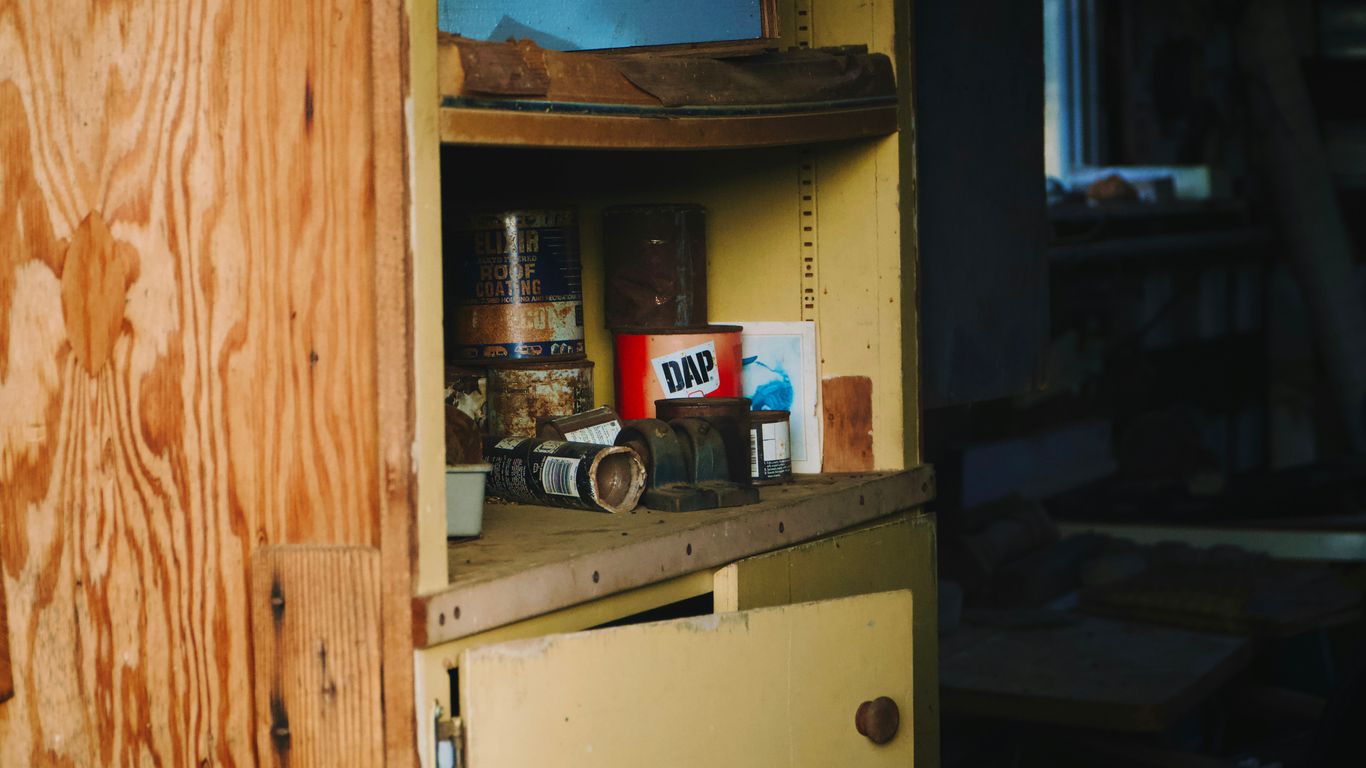 A cabinet with a television on top of it