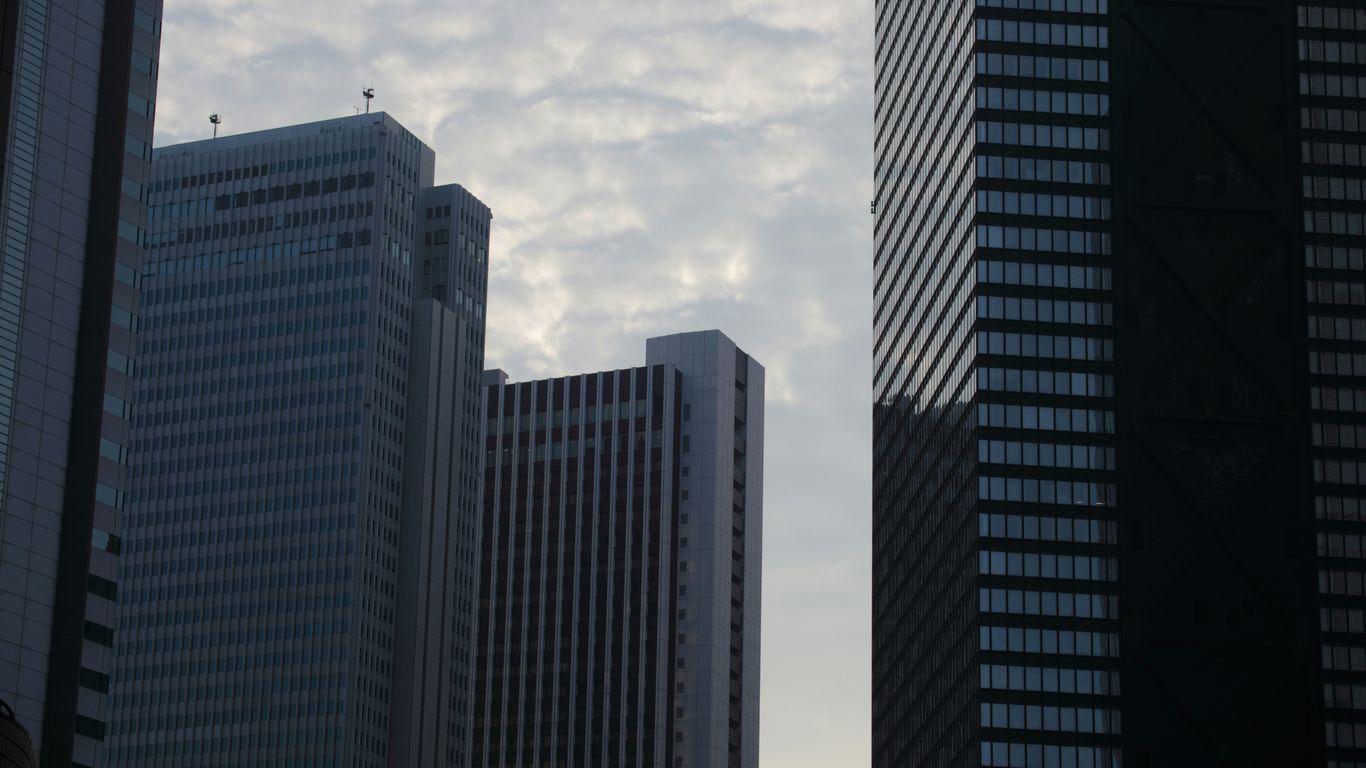 Modern skyscrapers against a cloudy sky