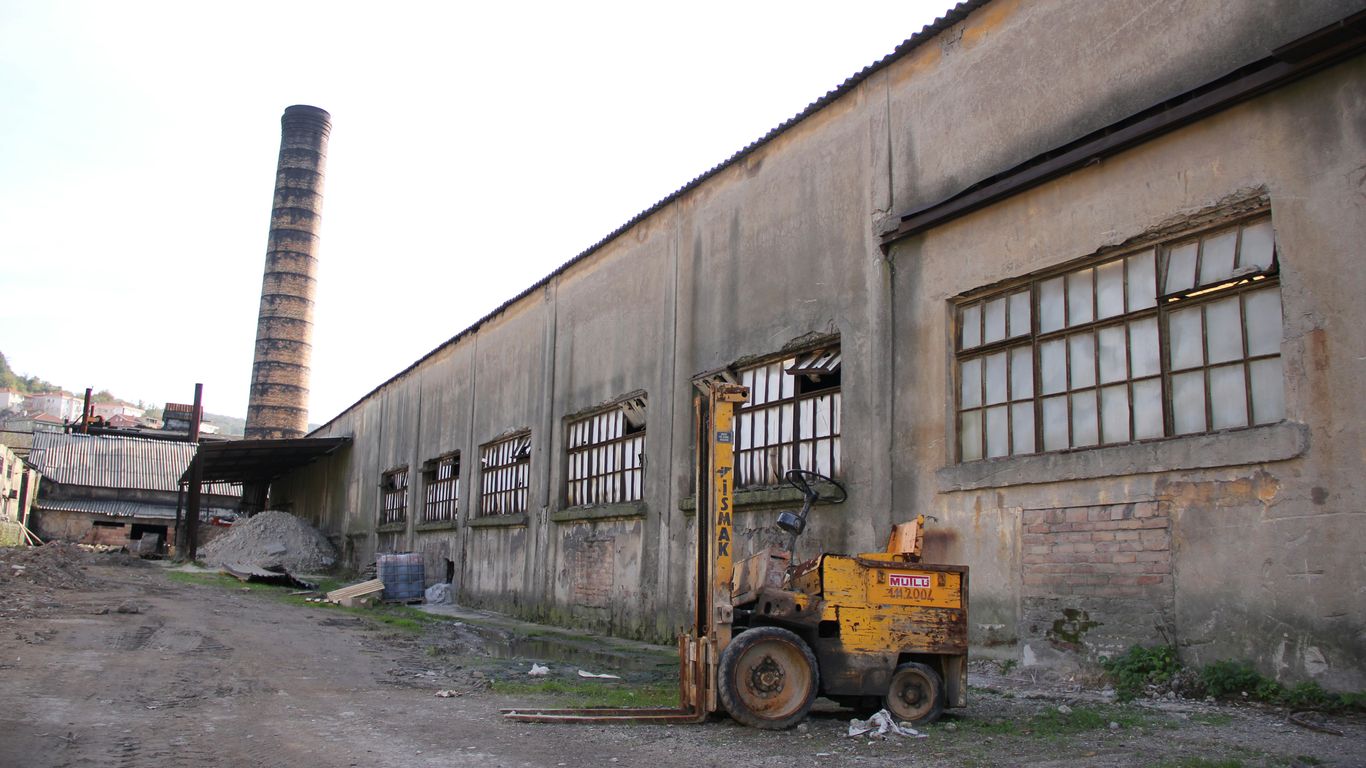 a large building with a large truck in front of it