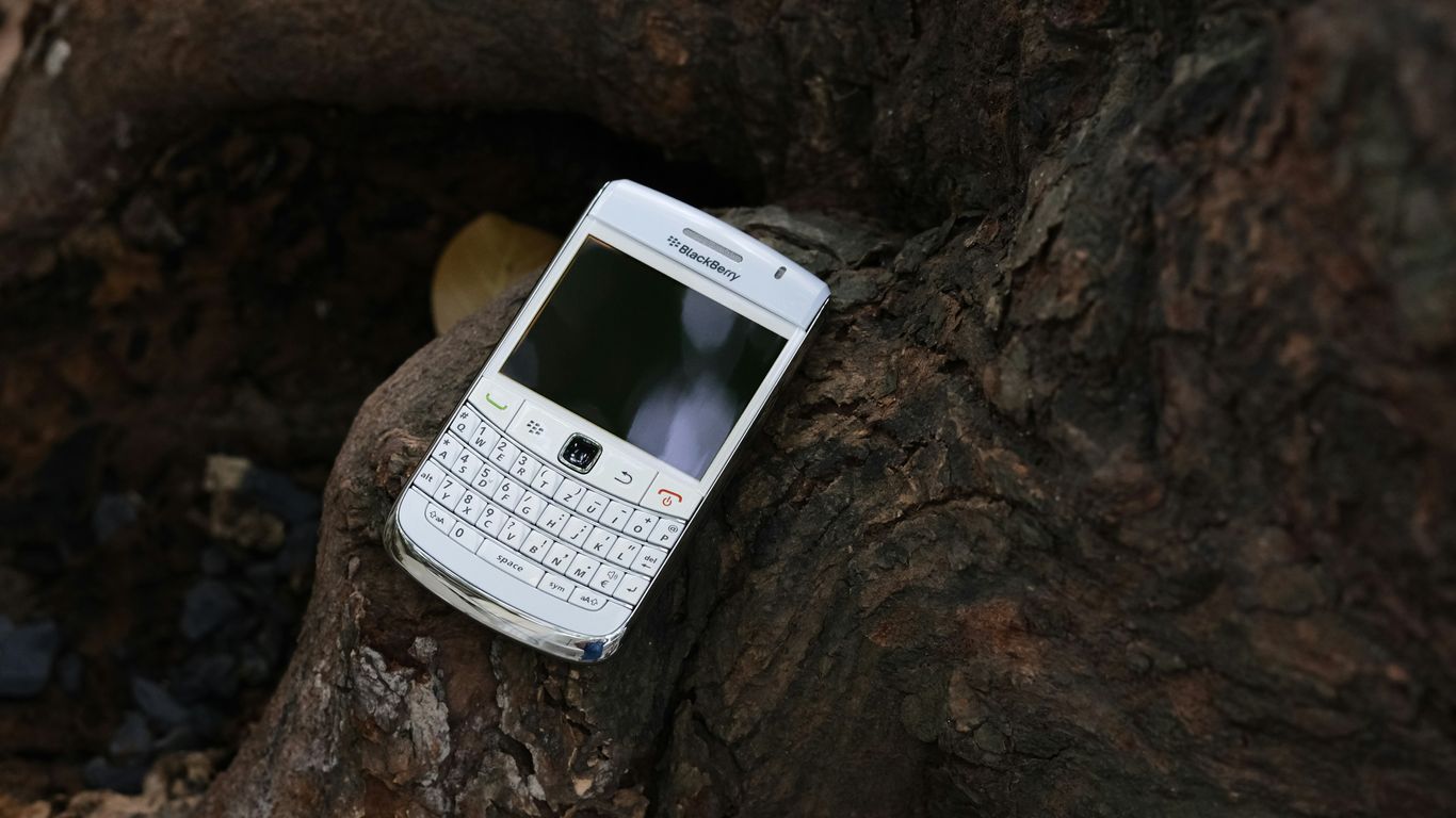 a cell phone on a rock