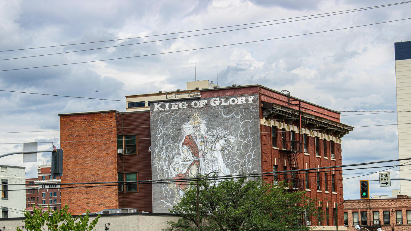 A large building with a mural on the side of it