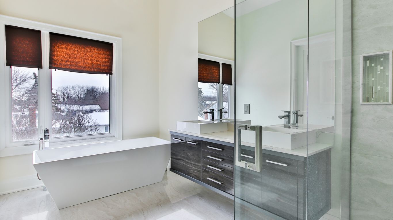 white wooden cabinet near white wall