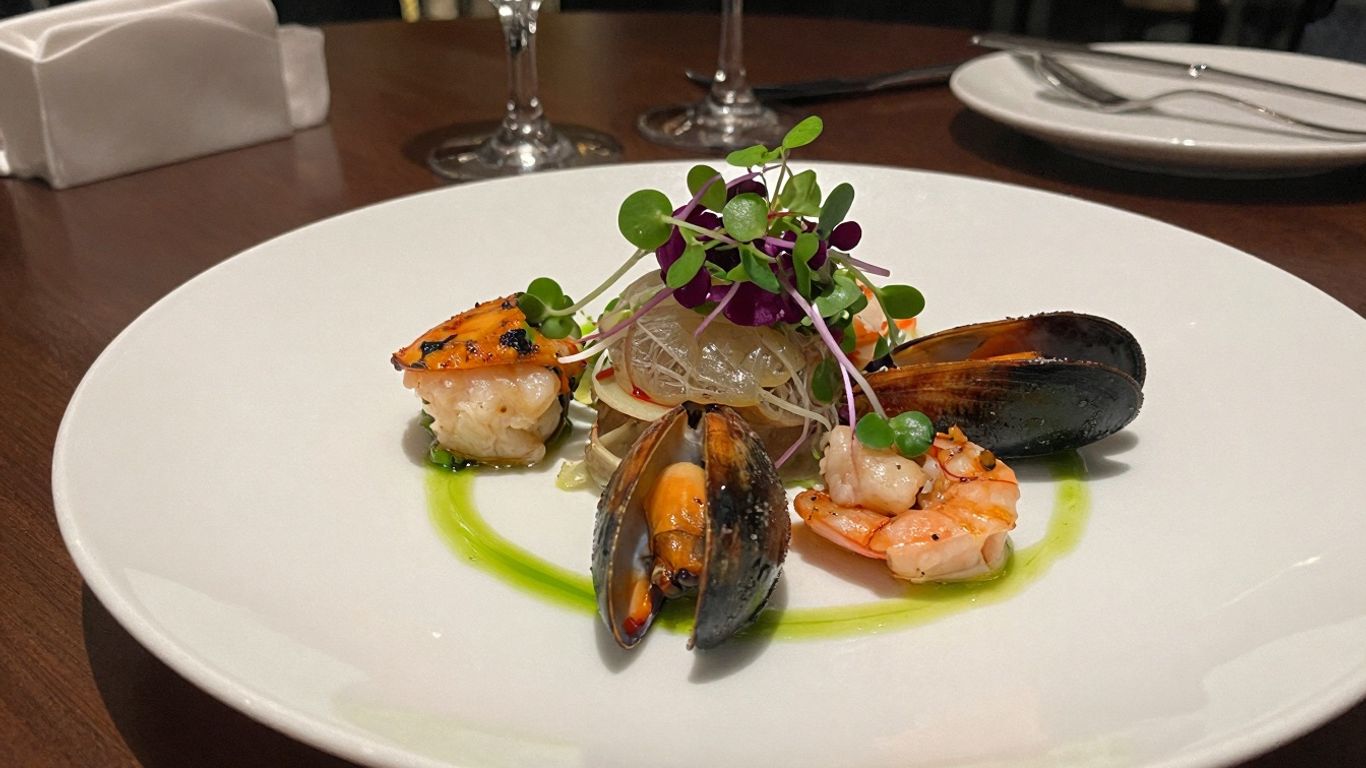 Elegant seafood dish at El Huerto restaurant in Cabo.