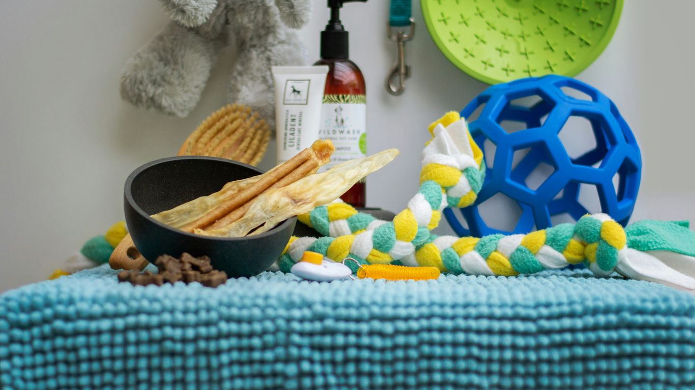 a table topped with a bowl of food and a bowl of crackers