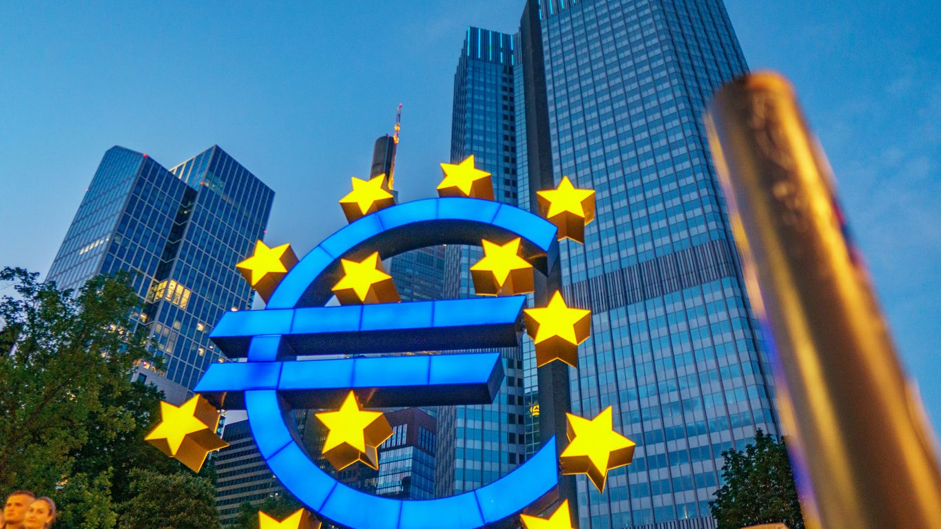 a large blue and yellow sign with stars on it