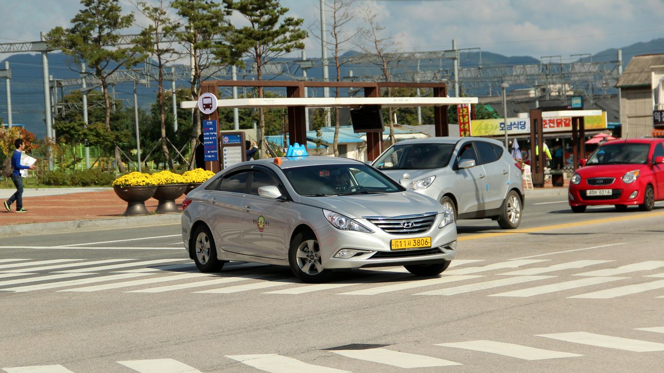 silver mercedes benz coupe on road during daytime