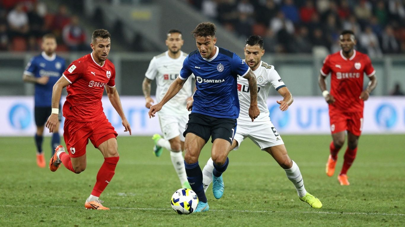 Serie B football match action on a green pitch.