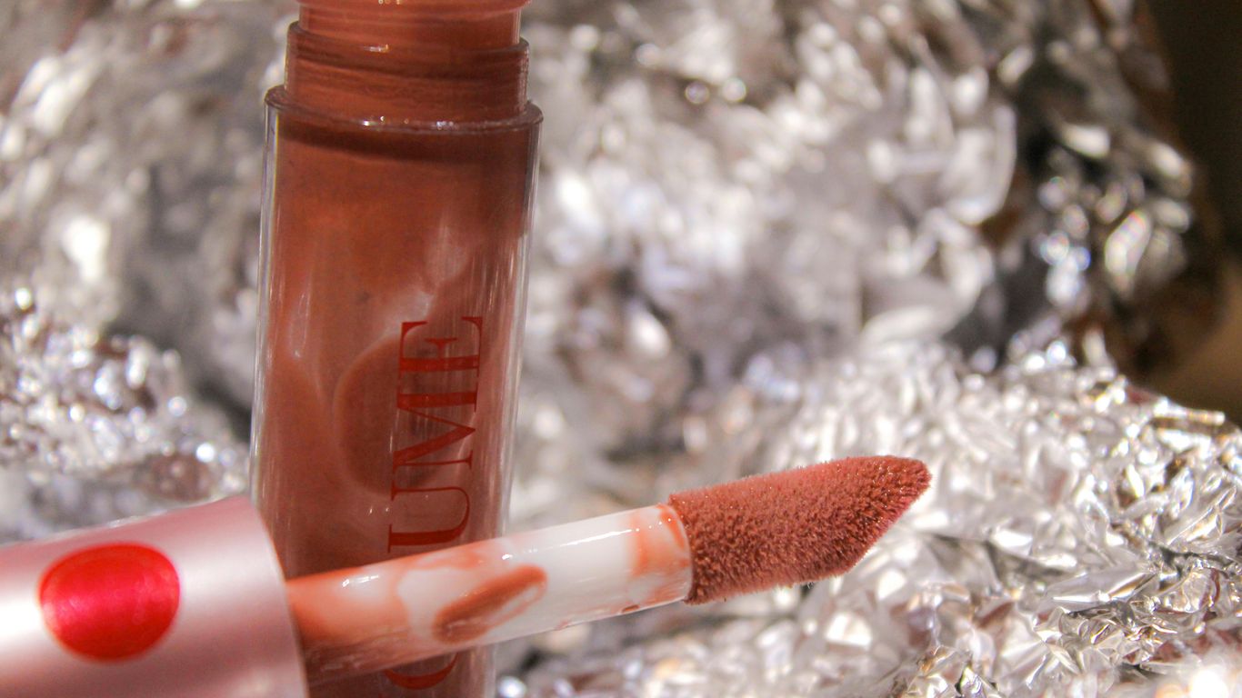 a close up of a lipstick on a piece of tin foil