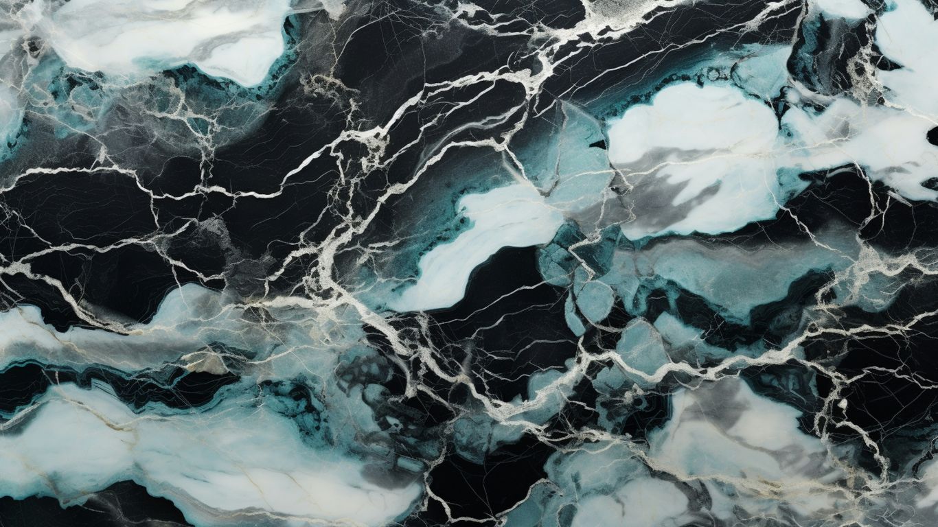 a black and white marble texture with blue and white swirls